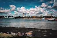 a large body of water with a boat on it