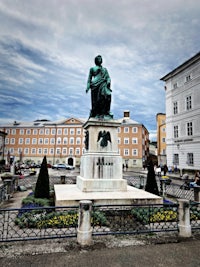 a statue in front of a building