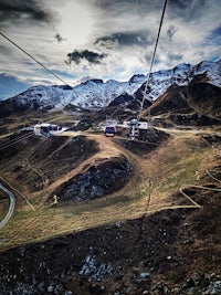 a cable car going up a mountain