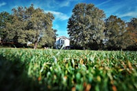 a house with a frisbee in the grass