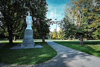 a statue in a park