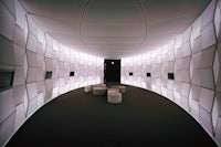 a circular room with white walls