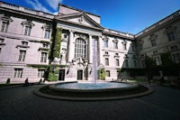 a fountain in front of a building