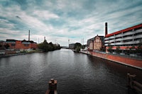 a river in a city with a lot of buildings