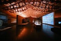 a wooden ceiling in a museum