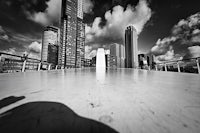 a black and white photo of a city with skyscrapers