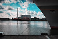 a large ship docked at a dock