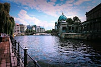 a waterway next to a building