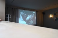 a projection screen in a room
