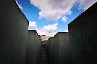 a group of concrete blocks with a blue sky in the background