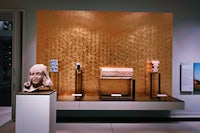a display of egyptian artifacts in a museum