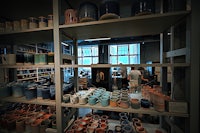 the shelves are full of mugs