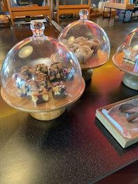 a table with a lot of desserts on it