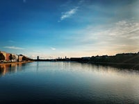 a city with a river in the background